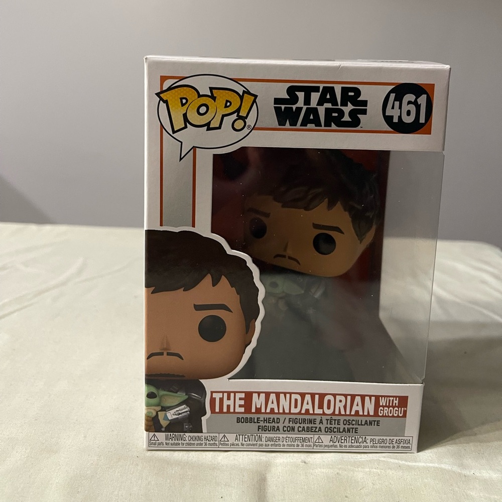 Star Wars 
Funko Pops 
The Mandalorian with Grogu #461